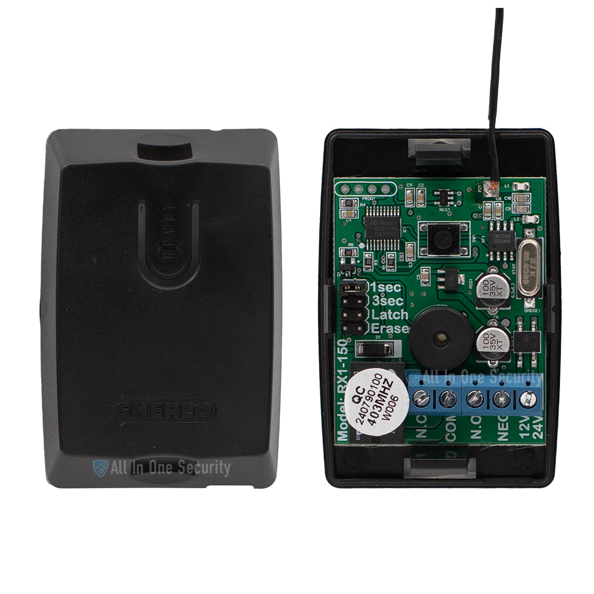 Sherlotronics 1 channel receiver 403MHz inside view showing circuit board, wiring terminals, and black housing cover