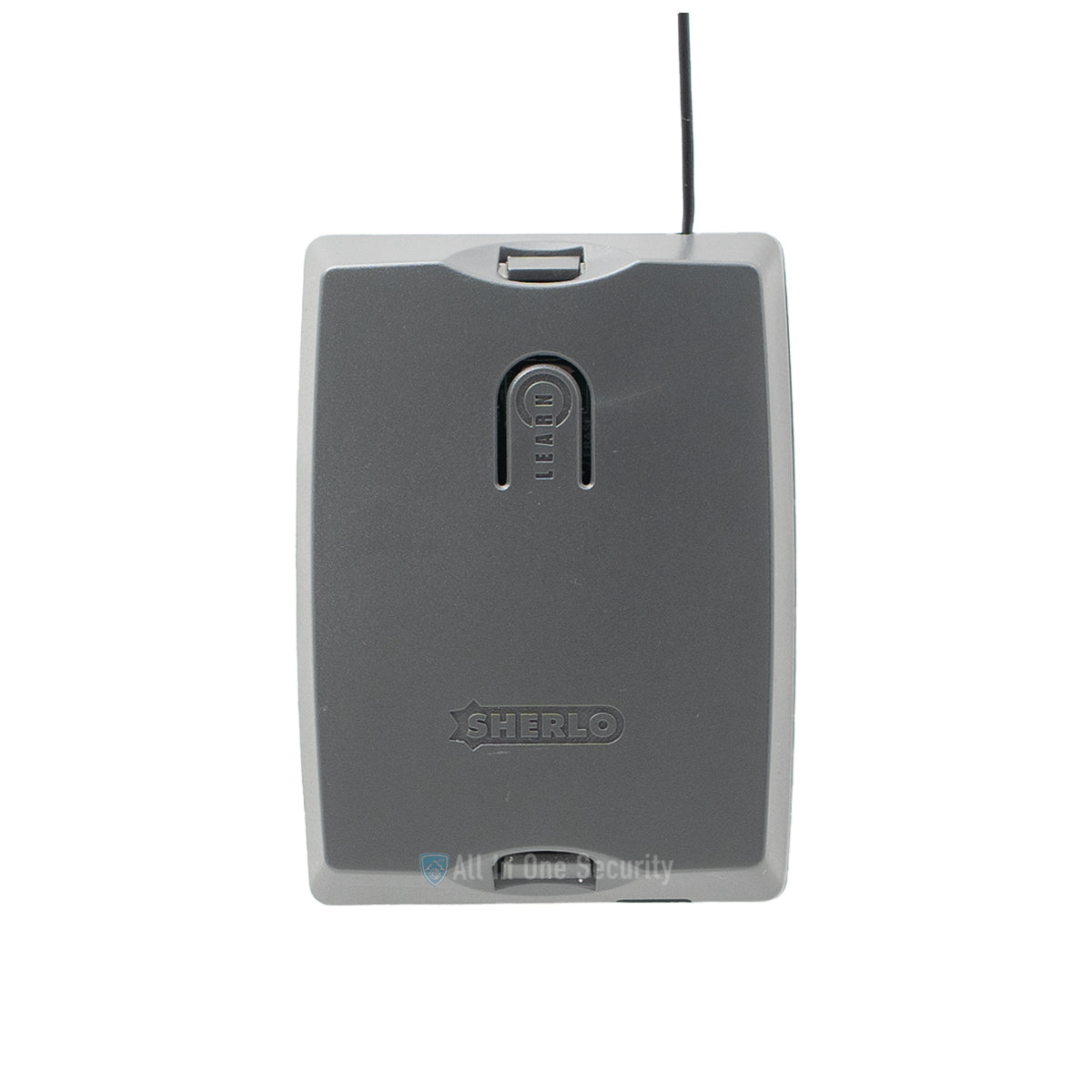 Sherlotronics 3 channel 403MHz receiver front view with antenna, durable casing and learn button for wireless security control