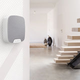 Ajax compact wireless indoor home siren in white.