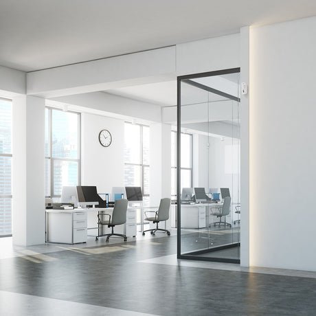 Ajax Wireless Indoor MotionCam installed in a office space, mounted near the ceiling.