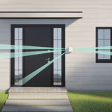 Wireless outdoor dual curtain sensor on a home's exterior, with beams extending from the sensor to the door.