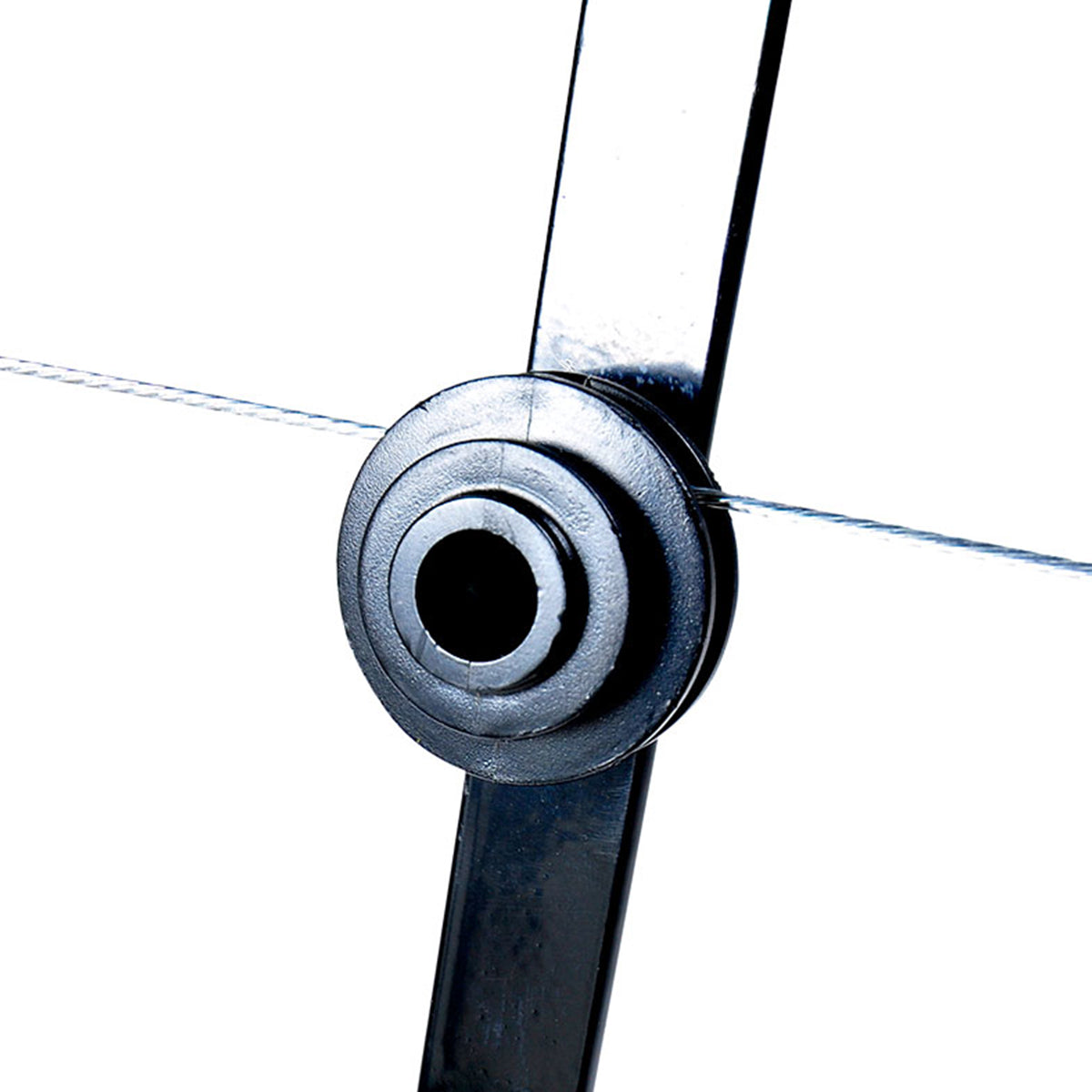 Close up of braided electric fence wire threaded through the insulator of a 6-line angled flat bar electric fence bracket.