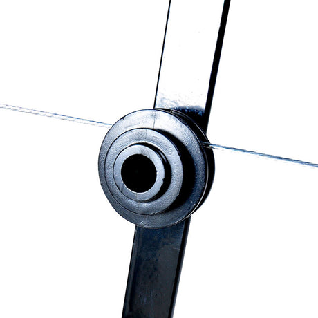 Close up of braided electric fence wire threaded through the insulator of a 6-line flat bar electric fence bracket.