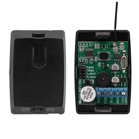 Sherlotronics 1 channel receiver 403MHz inside view showing circuit board, wiring terminals, and black housing cover