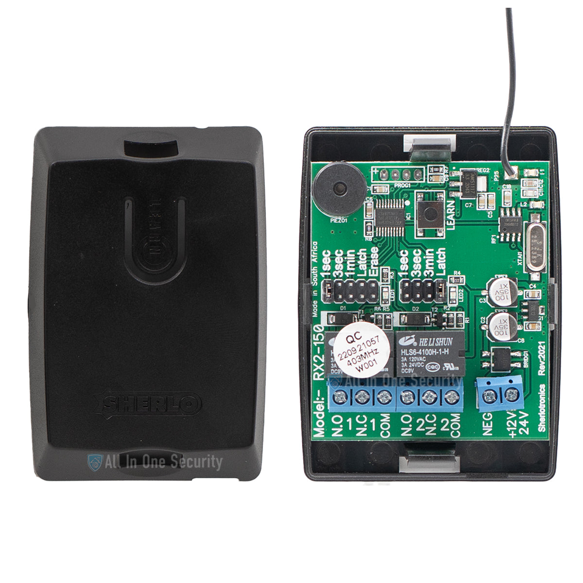 Sherlotronics 2 channel receiver 403MHz inside view with circuit board, wiring terminals, and cover for wireless security use