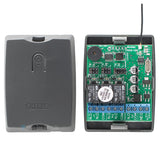 Sherlotronics 3 channel 403MHz receiver inside view with circuit board, relays, terminals and learn button for security systems.