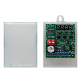 Sherlotronics multifunction digital timer module inside view showing PCB with LED display, DIP switches, and protective casing.