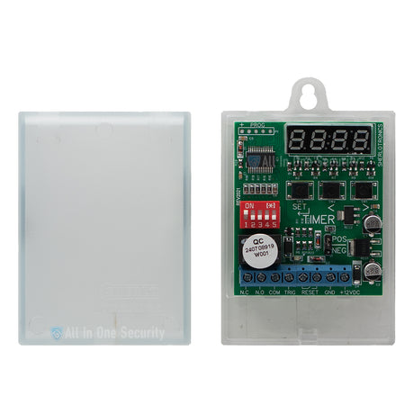 Sherlotronics multifunction digital timer module inside view showing PCB with LED display, DIP switches, and protective casing.