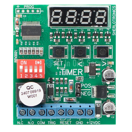 Sherlotronics multifunction digital timer module PCB view with LED display, DIP switches, control buttons, and terminal block.