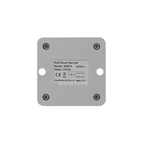 Sherlotronics wall mount remote transmitter WMTX 403MHz, back view, CE approval, and mounting screw points.