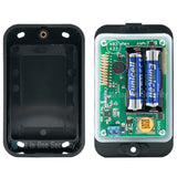 Sherlotronics wireless 9-channel 1000 user keypad inside view showing battery compartment and electronic circuit board.