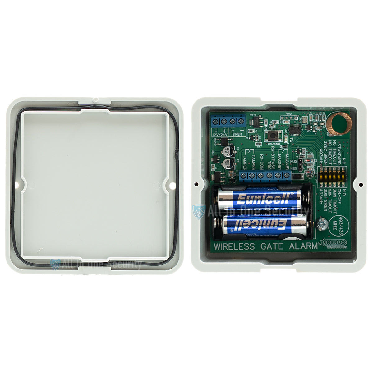 Sherlotronics wireless gate alarm transmitter 433Mhz inside view with batteries installed and protective casing open