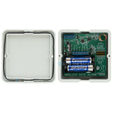 Sherlotronics wireless gate alarm transmitter 433Mhz inside view with batteries installed and protective casing open